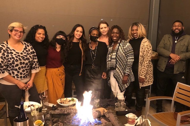 Women posing for a picture at a restaurant