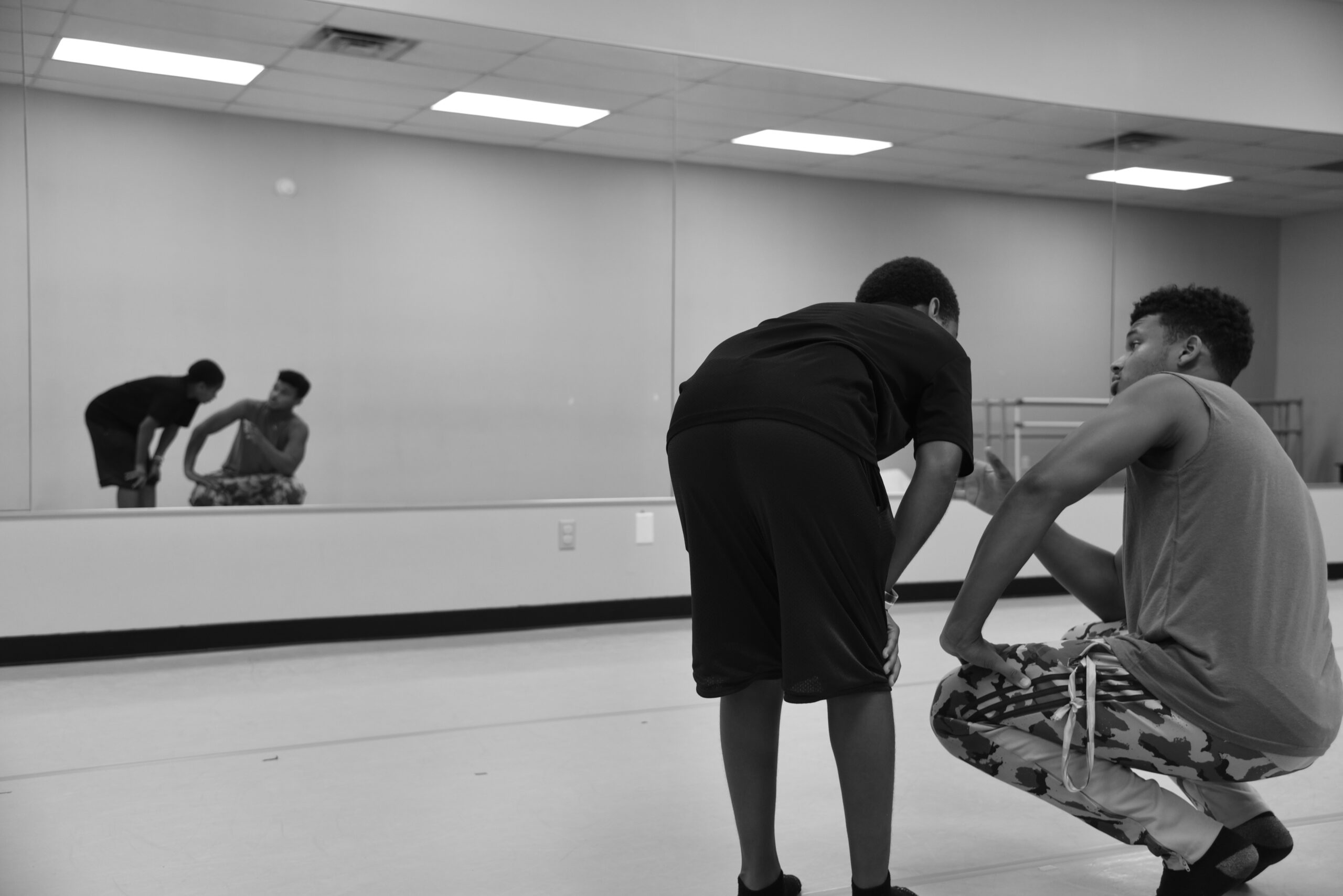 A man and a boy in a studio